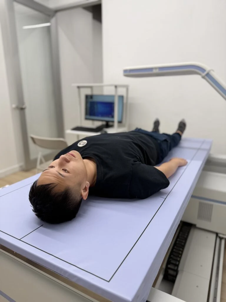 Client on a BodyStats DEXA scanner