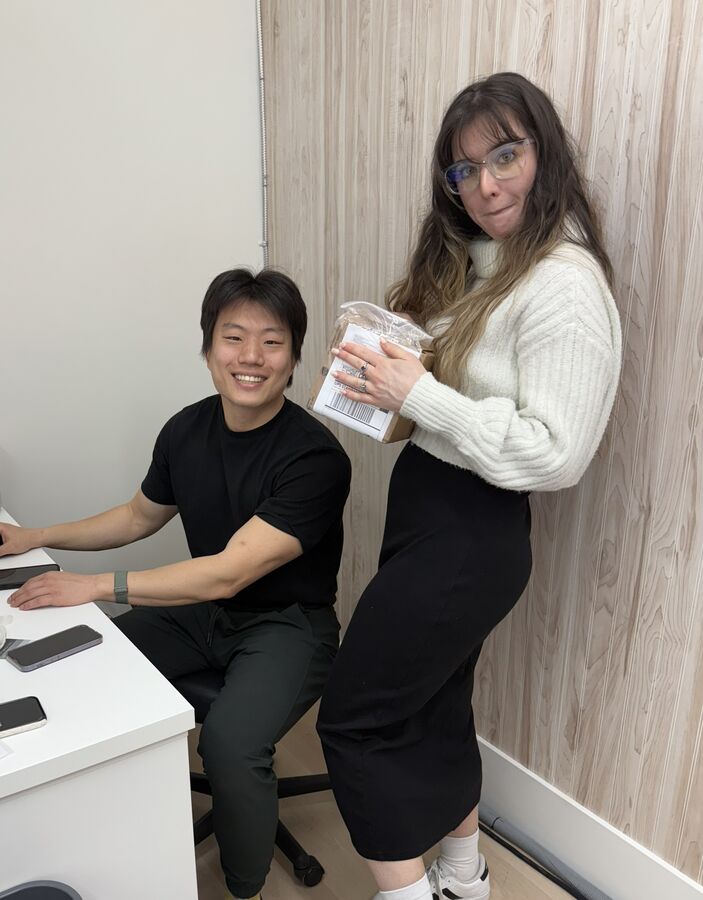 BodyStats technician reviewing DEXA scan results with a client