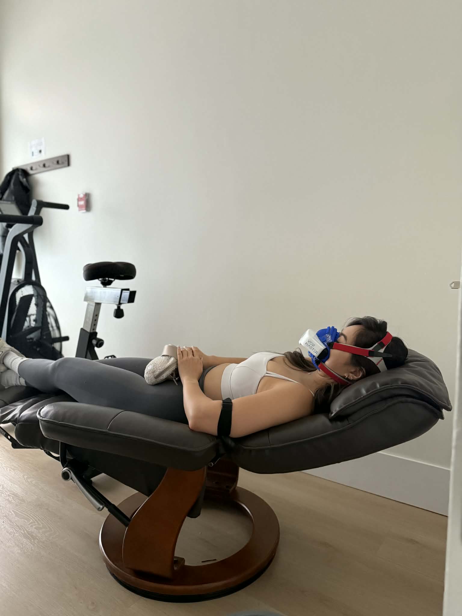 Client reclining during a BodyStats resting metabolic rate test