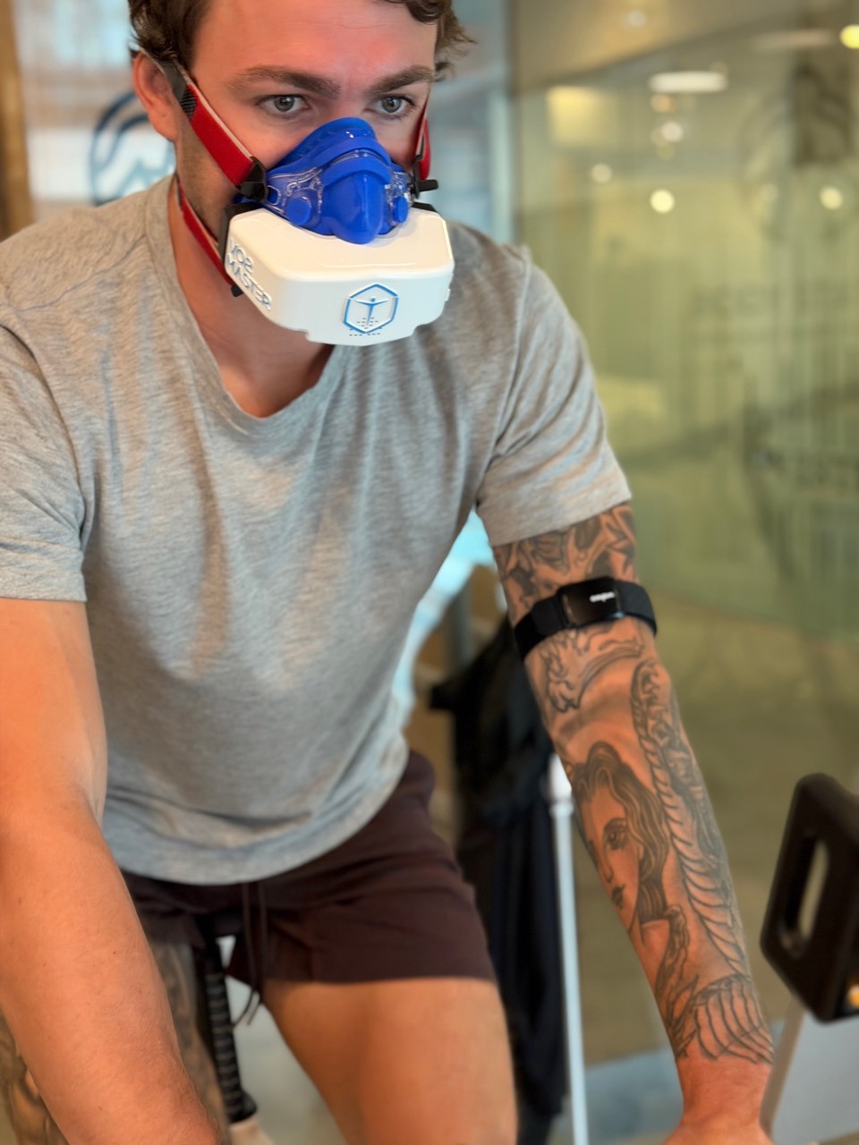 Client completing a cycle VO2 max test with a VO2 Master mask at BodyStats Yaletown