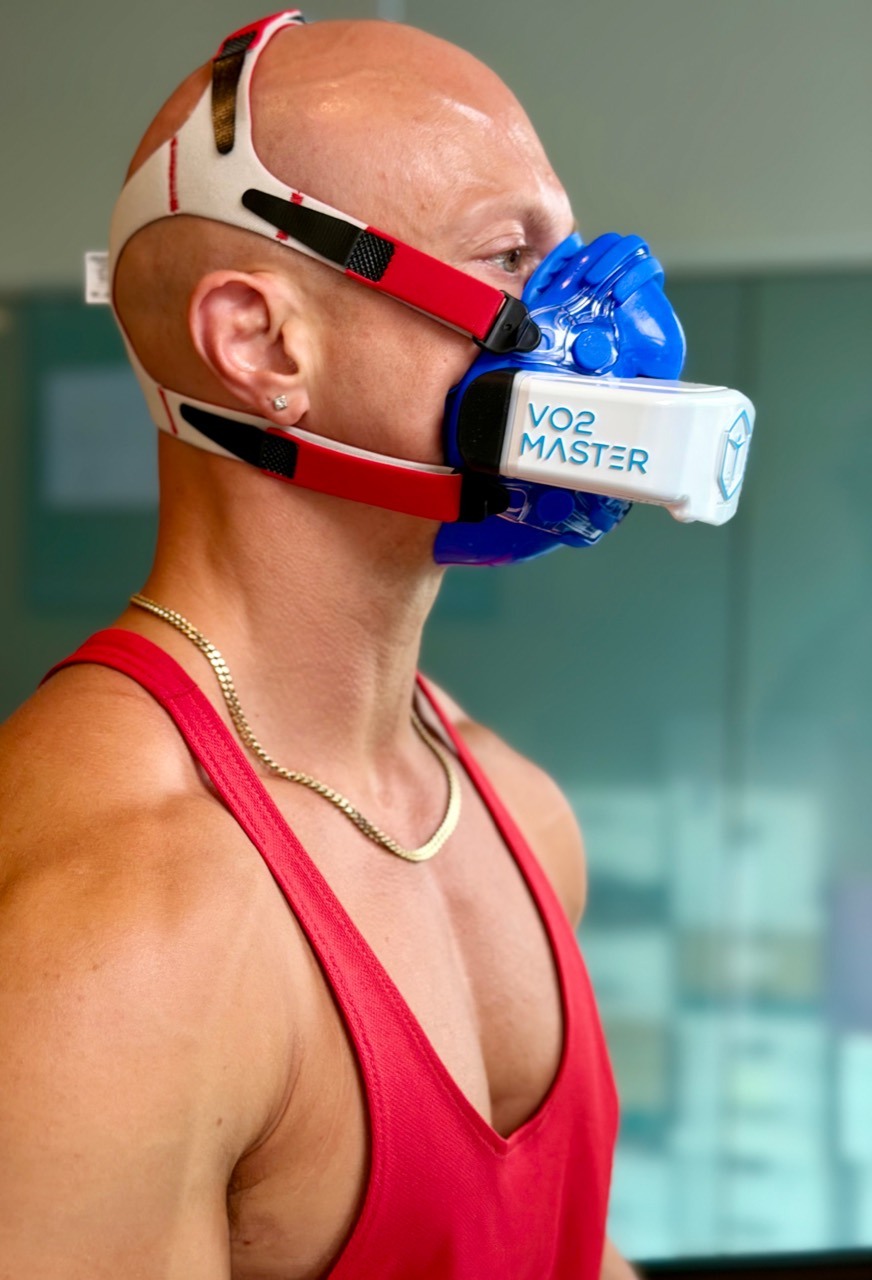 Client wearing a VO2 Master mask for metabolic testing at BodyStats Yaletown