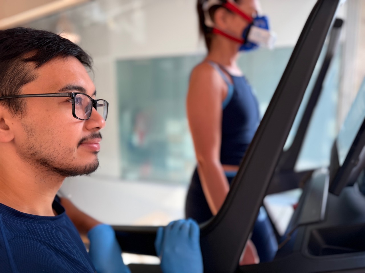 BodyStats technician monitoring a treadmill VO2 max test at the Yaletown studio