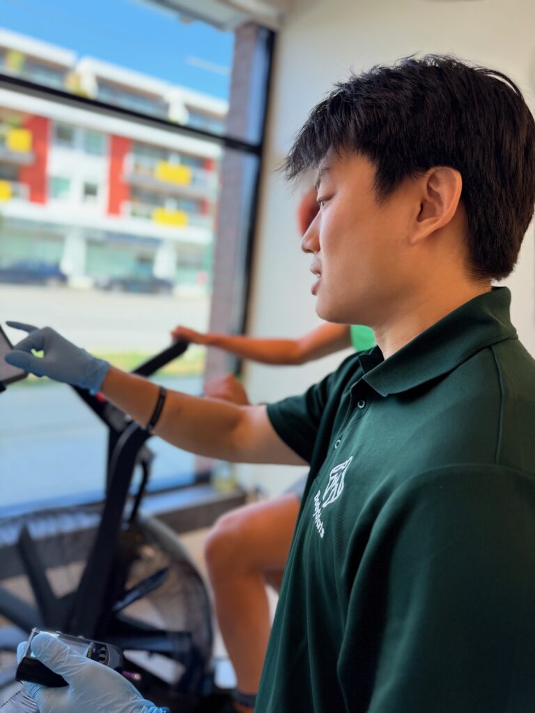 BodyStats technician running a lactate threshold bike test at BodyStats Fraser