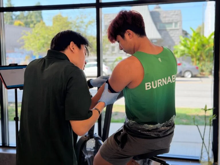 A participant on the bike during a lactate test at BodyStats